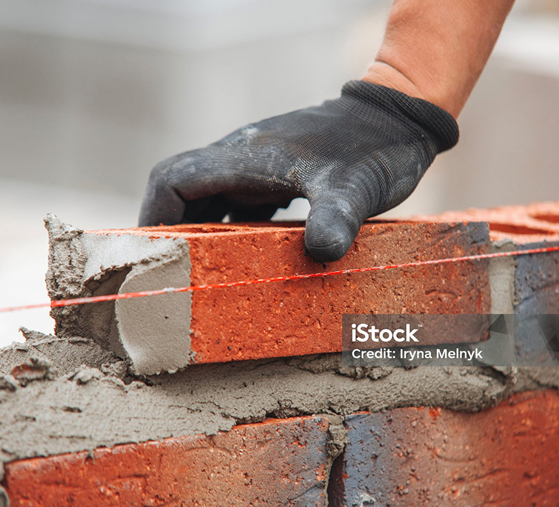 Laying a brick