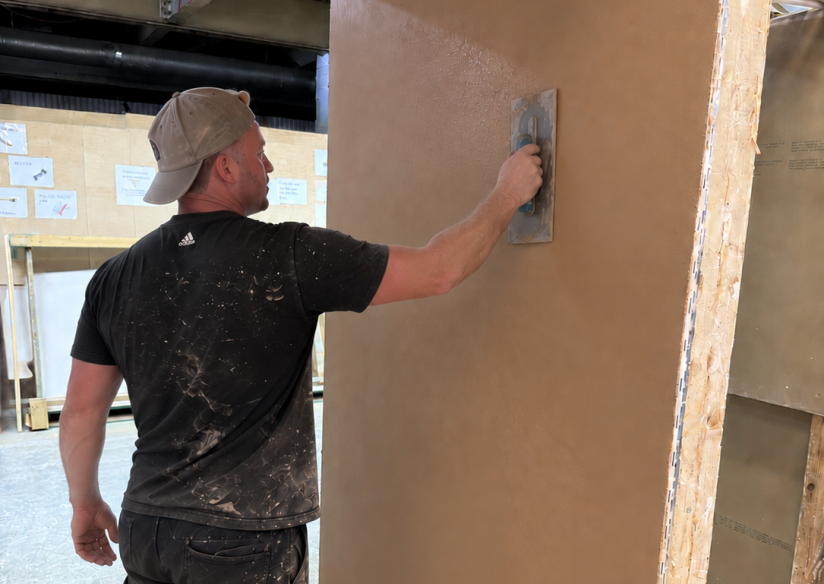 man plastering